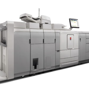 A large printer with many machines on the side.
