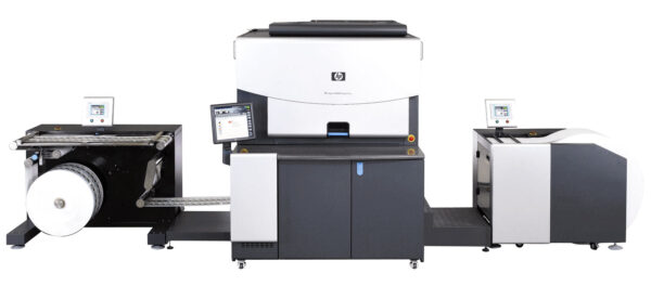 A large printer is shown with the front of it open.