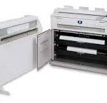 A printer with its door open and the front of it opened.