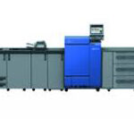 A large printer is shown with many drawers.