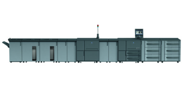 A large printer is shown with many doors open.