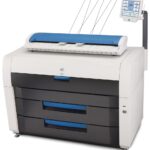 A printer that is sitting on top of a table.