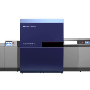 A large printer is shown with two large machines.