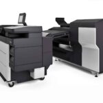 A printer that is sitting on top of a table.