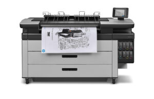 A large printer with some drawings on it