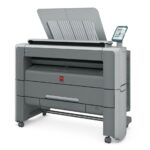 A printer that is sitting on top of a table.