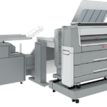 A large printer is shown with its side open.