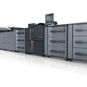 A large printer is lined up with many drawers.