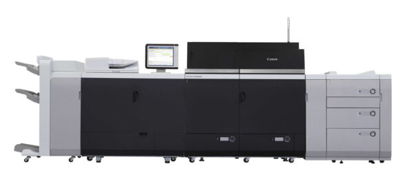 A large printer with two large drawers and one larger drawer.