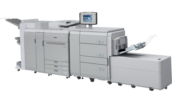 A large printer with two big machines on the side.