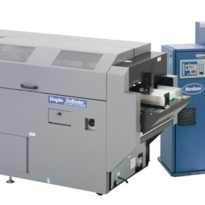 A machine that is sitting next to another machine.