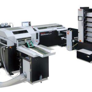 A large printer and some machines in a room.