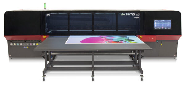 A large printer with a large screen on top of it.