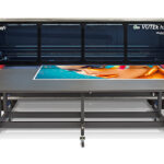 A large printer with a picture on it.