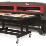 A large printer with two trays on top of it.