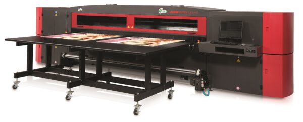 A large printer with two trays on top of it.